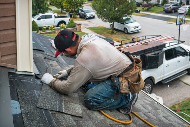 Professional Flat Roof Repair technician working in Belmont, MI